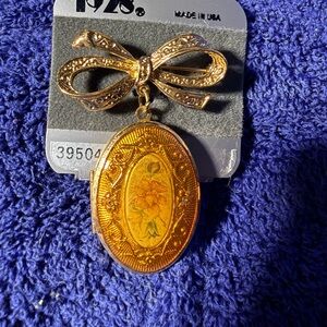 1928 Gold Bow Locket Brooch with Floral Accent